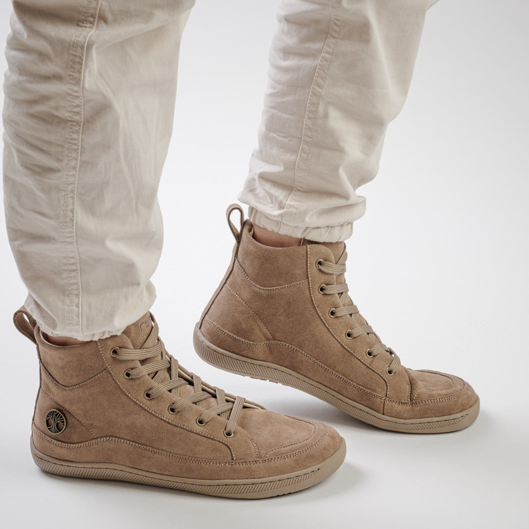 a pair of high-top minimalist sneakers from Rutsu Barefoot.